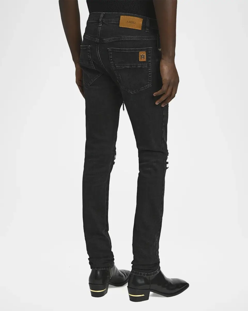 AMIRI Men's Studded Rip and Repair Black Denim Skinny Jeans | Thumbnail 3 AMIRI Men's Studded Rip and Repair Black Denim Skinny Jeans | Thumbnail 3