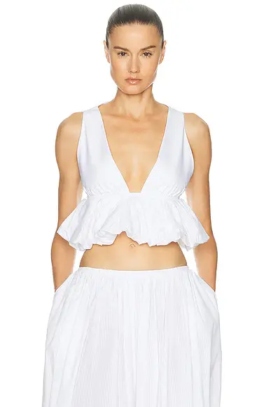 ALAÏA Peplum Openwork Crop Top | Image 1 ALAÏA Peplum Openwork Crop Top | Image 1