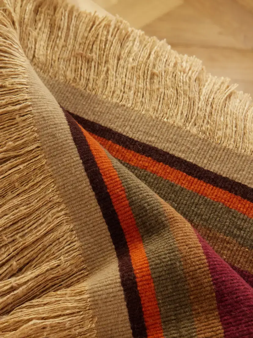 The House of Lyria Grottesco Fringes Striped Woven Throw | Thumbnail 3 The House of Lyria Grottesco Fringes Striped Woven Throw | Thumbnail 3