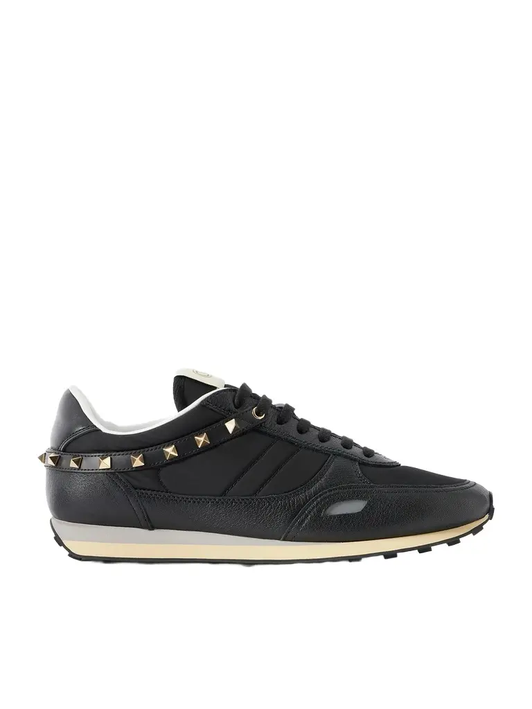 Valentino Garavani Stud Up Embellished Leather-Trimmed Sneakers - Men | Image 1 Valentino Garavani Stud Up Embellished Leather-Trimmed Sneakers - Men | Image 1