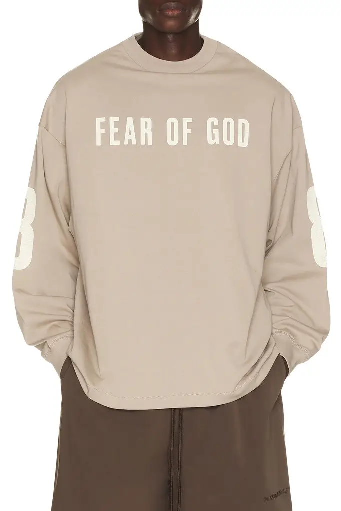 Fear of God Essentials Merch Long Sleeve Tee | Image 1 Fear of God Essentials Merch Long Sleeve Tee | Image 1