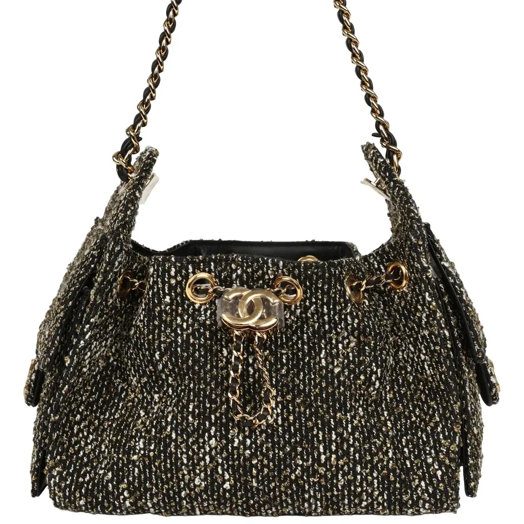 Chanel Chanel Mini 25 Hobo Bag Black, White, Gold Tweed Boucle Gold Hardware | Image 1 Chanel Chanel Mini 25 Hobo Bag Black, White, Gold Tweed Boucle Gold Hardware | Image 1