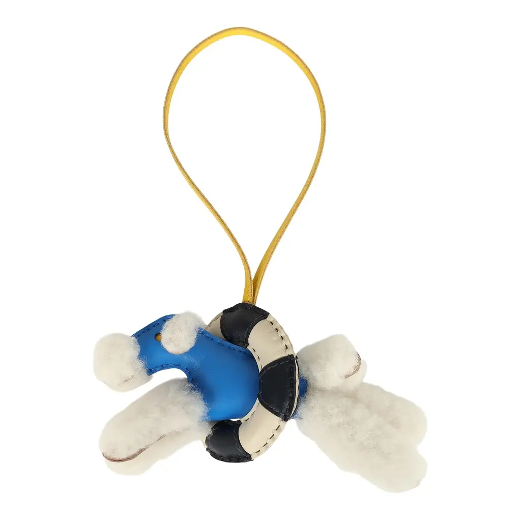 HERMÈS Hermes "A La Mer" Budy Charm Ecru, Bleu Hydra, Jaune De Naples, Bleu Nuit, Craie Merino Wool and Milo Lambskin | Image 1 HERMÈS Hermes "A La Mer" Budy Charm Ecru, Bleu Hydra, Jaune De Naples, Bleu Nuit, Craie Merino Wool and Milo Lambskin | Image 1