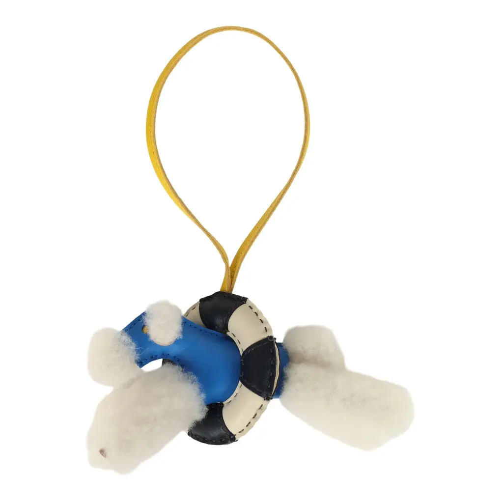 HERMÈS Hermes "A La Mer" Budy Charm Ecru, Bleu Hydra, Jaune De Naples, Bleu Nuit, Craie Merino Wool and Milo Lambskin | Image 1 HERMÈS Hermes "A La Mer" Budy Charm Ecru, Bleu Hydra, Jaune De Naples, Bleu Nuit, Craie Merino Wool and Milo Lambskin | Image 1