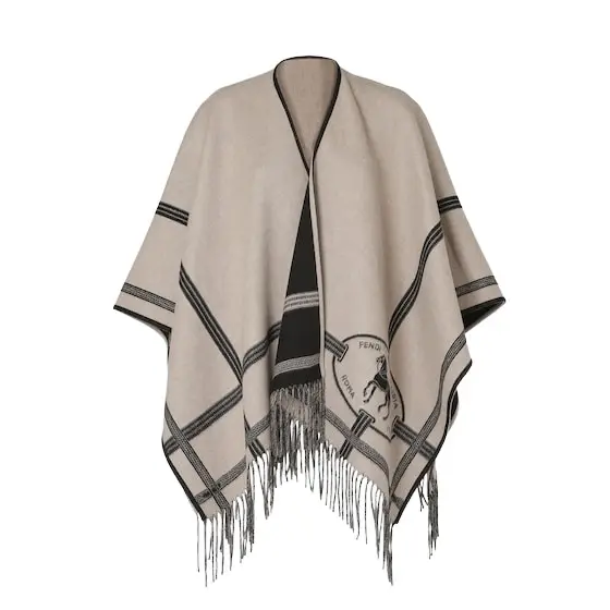 Fendi Large, enveloping poncho with the Selleria motif, a graphic | Image 1 Fendi Large, enveloping poncho with the Selleria motif, a graphic | Image 1