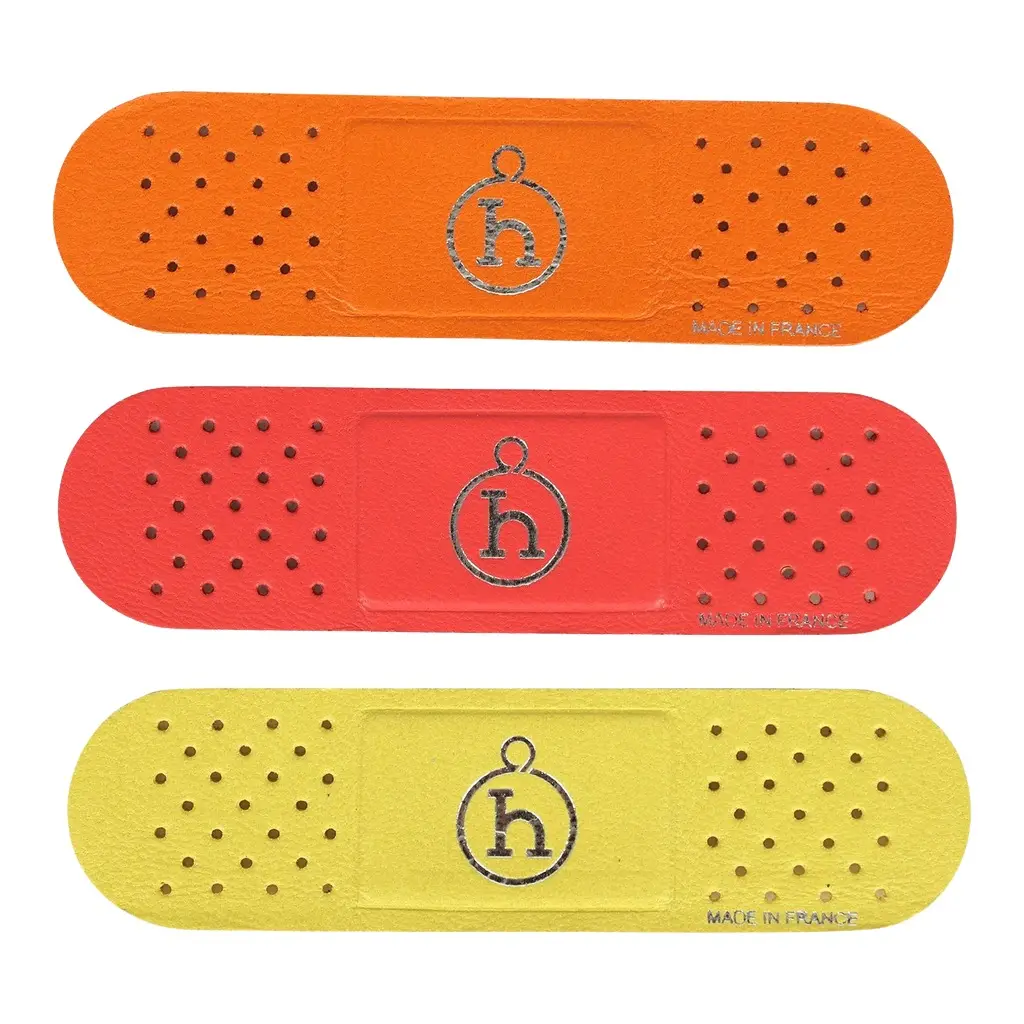 HERMÈS Hermes Band-Aid Orange, Orange Field, Lime Milo Lambskin | Image 1 HERMÈS Hermes Band-Aid Orange, Orange Field, Lime Milo Lambskin | Image 1