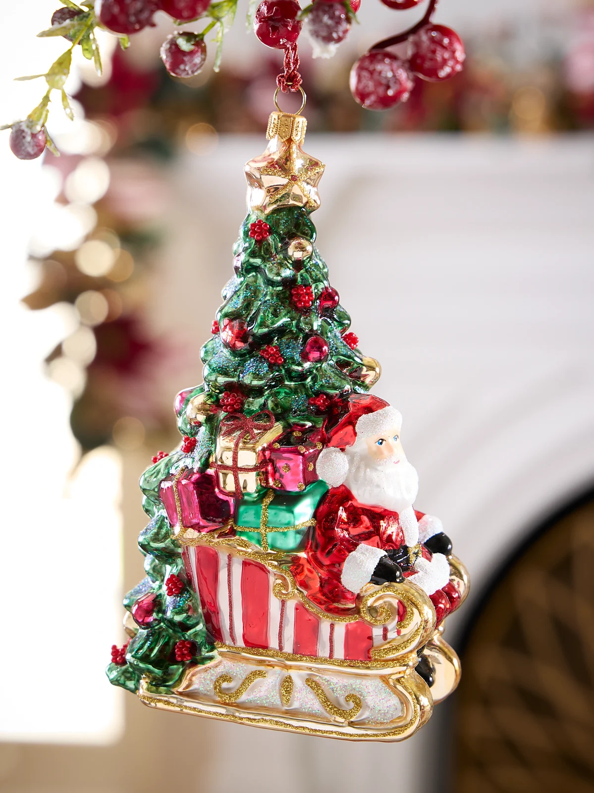 Exclusively Ours Santa In Sleigh By The Tree Glass Ornament