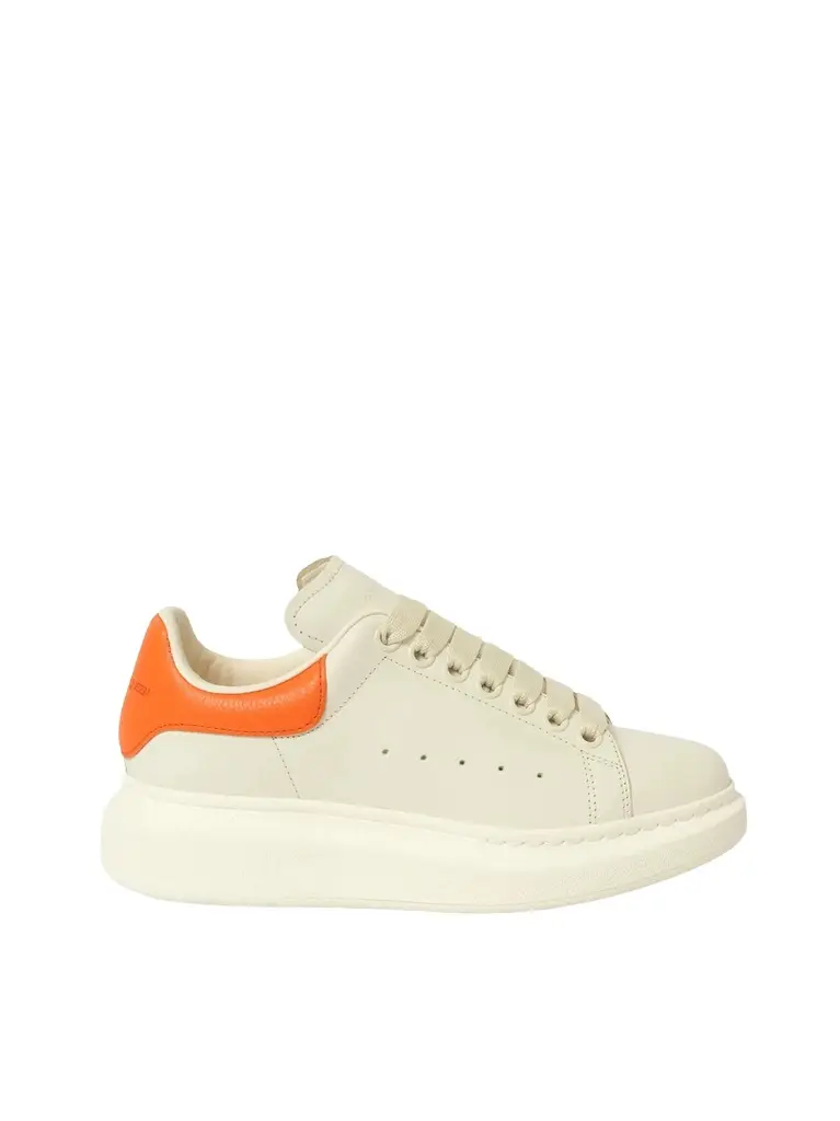 Alexander McQueen Larry Oversized Sneaker in Off White/orange White | Image 1 Alexander McQueen Larry Oversized Sneaker in Off White/orange White | Image 1