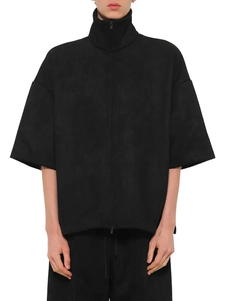 Fear of God Essentials High Neck 3/4 Sleeve Jacket | Image 1 Fear of God Essentials High Neck 3/4 Sleeve Jacket | Image 1