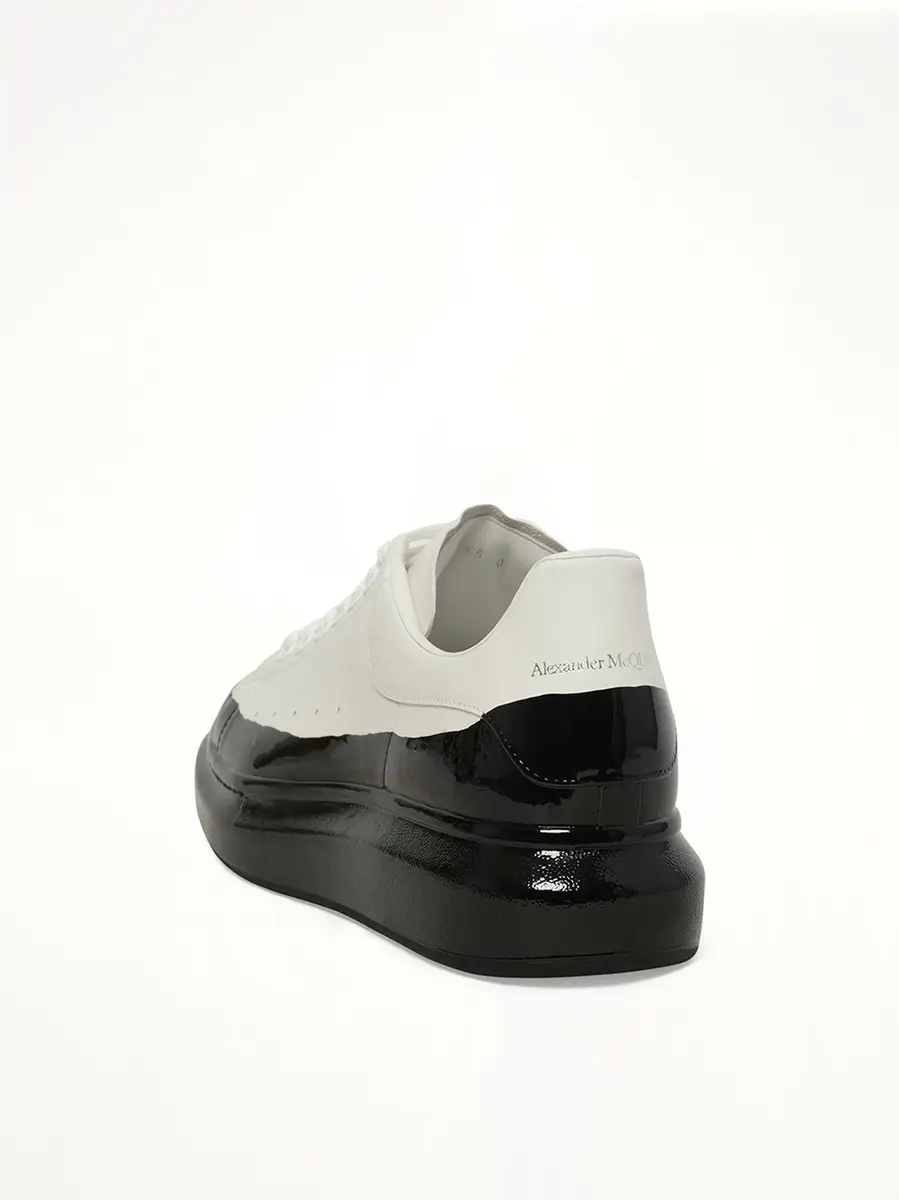 Alexander McQueen Larry Oversized Dipped Sneaker in White/black White | Thumbnail 2 Alexander McQueen Larry Oversized Dipped Sneaker in White/black White | Thumbnail 2
