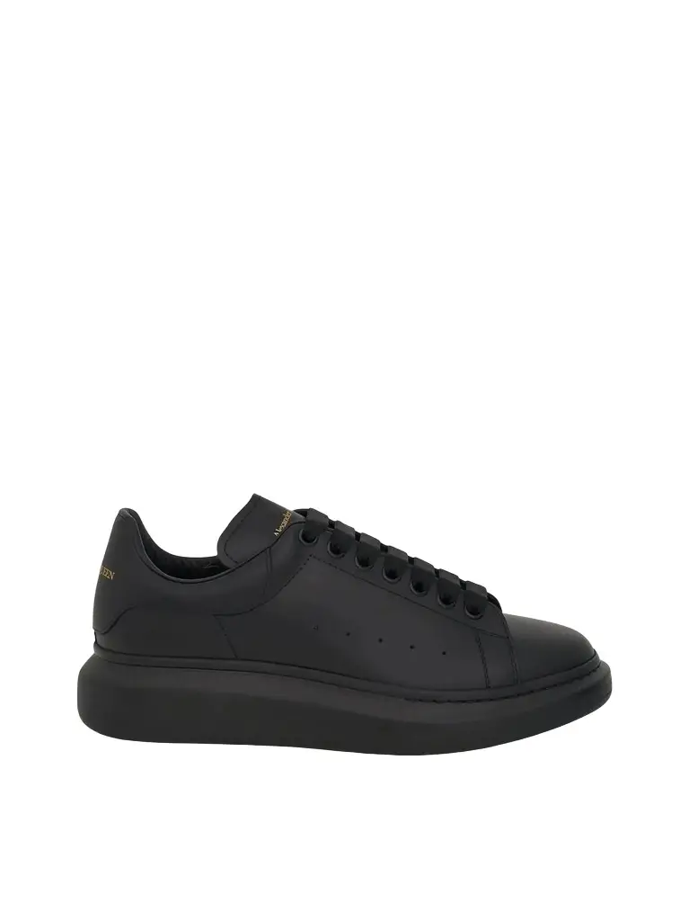 Alexander McQueen Larry Oversized Rubber Sneaker | Image 1 Alexander McQueen Larry Oversized Rubber Sneaker | Image 1