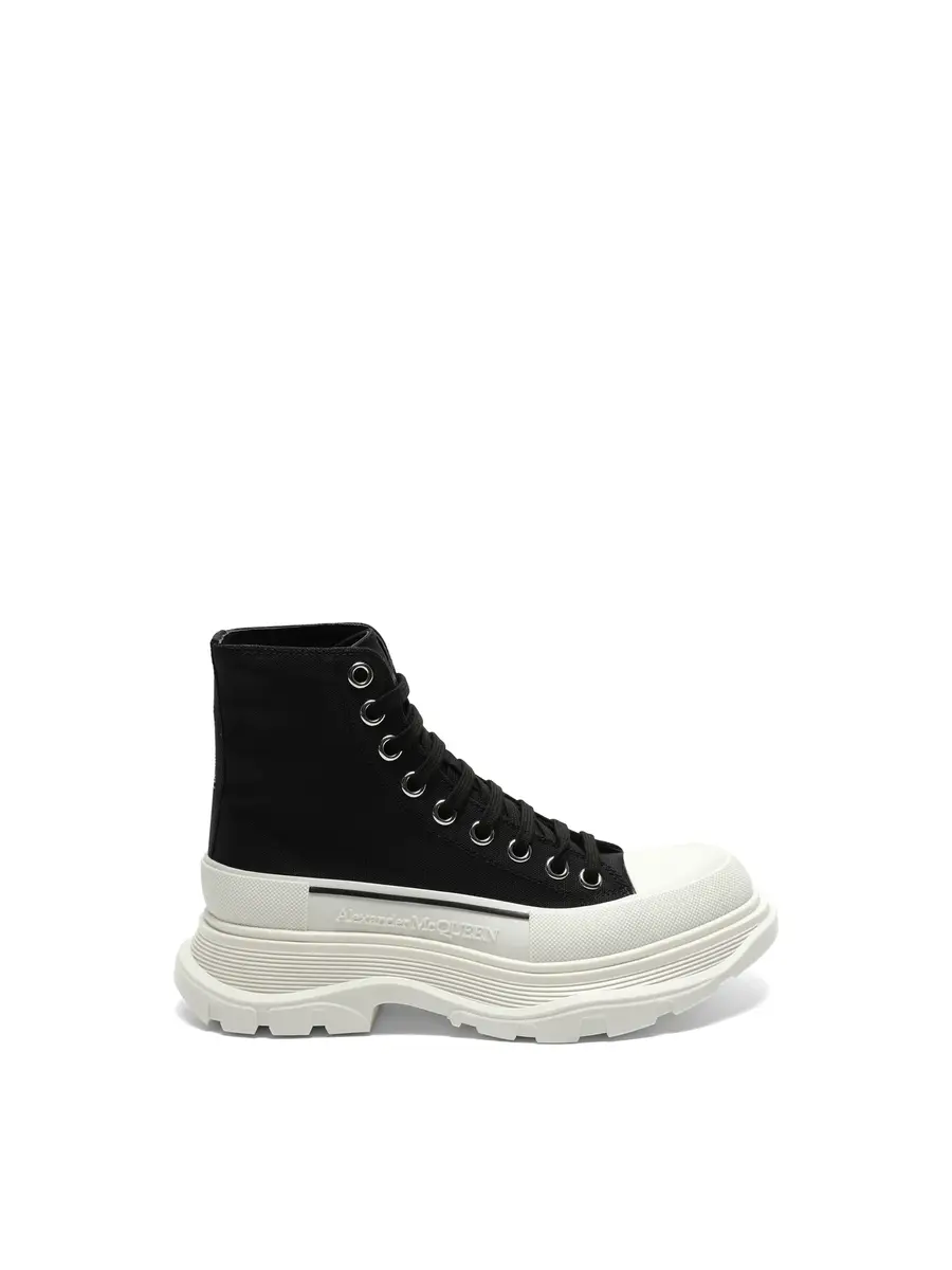 Alexander McQueen Tread Slick Canvas Lace-up Boots in Black/white Black | Image 1 Alexander McQueen Tread Slick Canvas Lace-up Boots in Black/white Black | Image 1