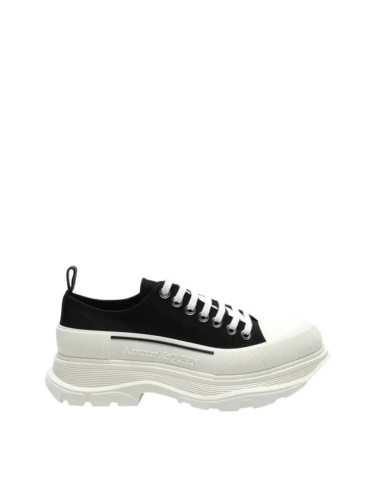 Alexander McQueen Tread Slick Canvas Lace-up Shoes in Black/white Black | Image 1 Alexander McQueen Tread Slick Canvas Lace-up Shoes in Black/white Black | Image 1