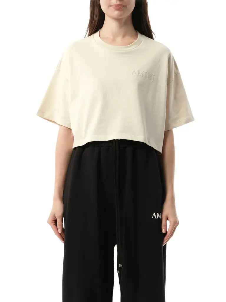 AMIRI Amiri Embroidered Cropped T-shirt in Alabaster White | Image 1 AMIRI Amiri Embroidered Cropped T-shirt in Alabaster White | Image 1