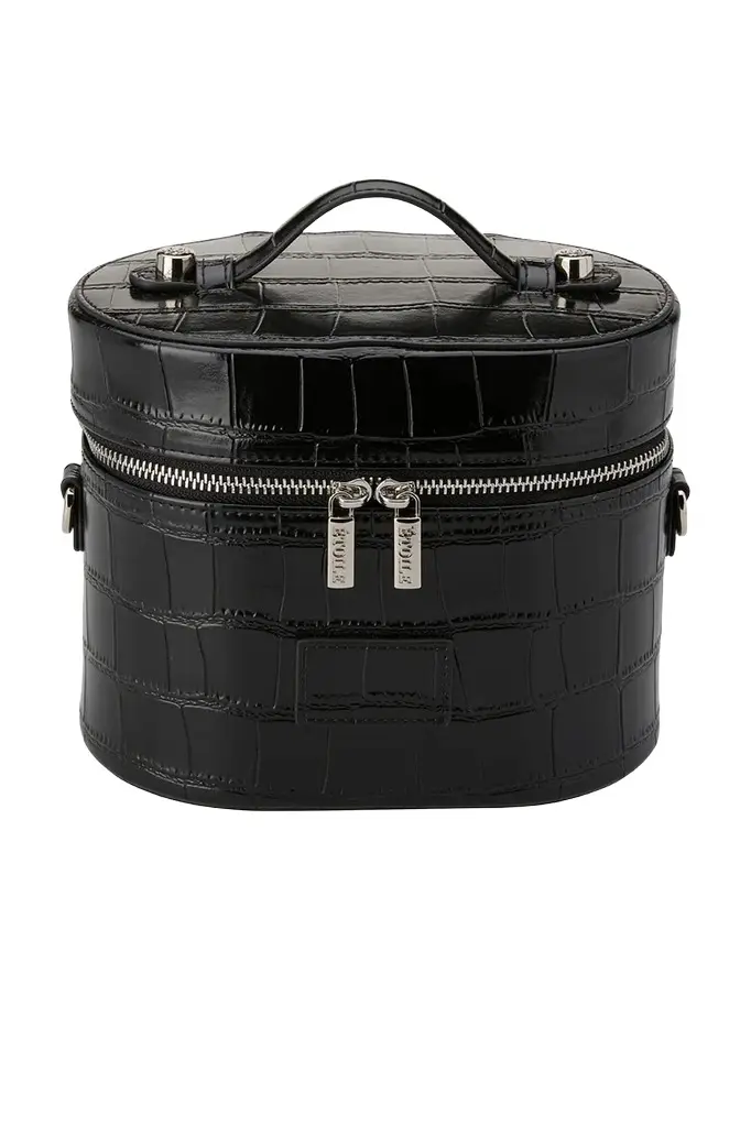 ETOILE COLLECTIVE Oval Toiletry Case | Image 1 ETOILE COLLECTIVE Oval Toiletry Case | Image 1