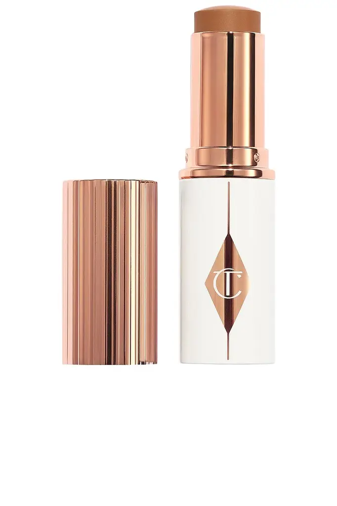Charlotte Tilbury Unreal Skin Sheer Glow Tint Hydrating Foundation Stick | Image 1 Charlotte Tilbury Unreal Skin Sheer Glow Tint Hydrating Foundation Stick | Image 1