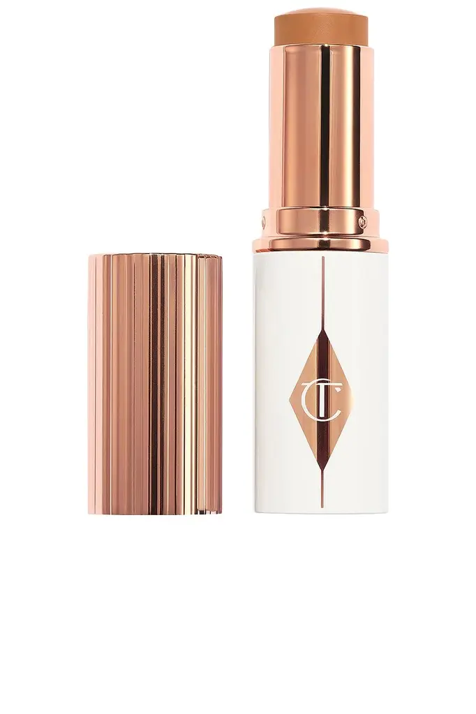 Charlotte Tilbury Unreal Skin Sheer Glow Tint Hydrating Foundation Stick | Image 1 Charlotte Tilbury Unreal Skin Sheer Glow Tint Hydrating Foundation Stick | Image 1