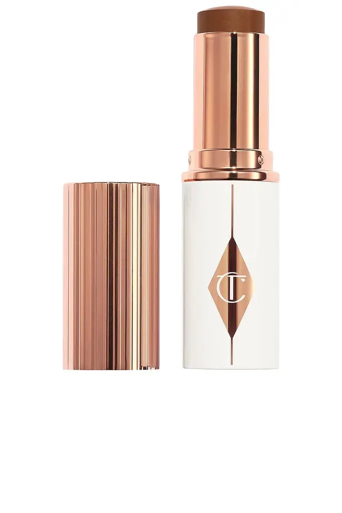 Charlotte Tilbury Unreal Skin Sheer Glow Tint Hydrating Foundation Stick | Image 1 Charlotte Tilbury Unreal Skin Sheer Glow Tint Hydrating Foundation Stick | Image 1