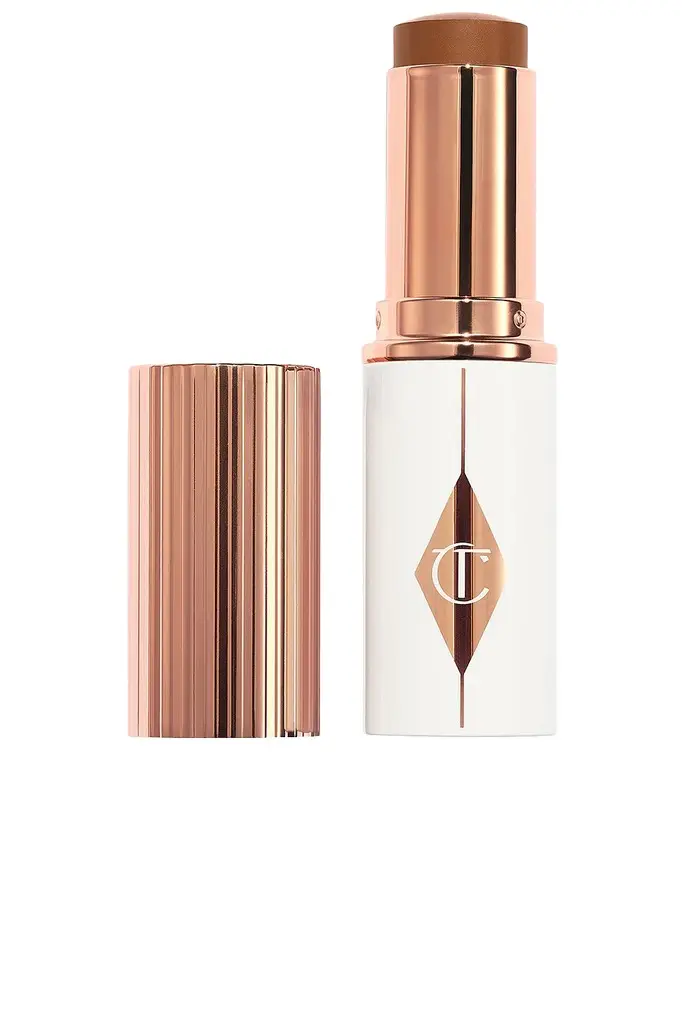 Charlotte Tilbury Unreal Skin Sheer Glow Tint Hydrating Foundation Stick | Image 1 Charlotte Tilbury Unreal Skin Sheer Glow Tint Hydrating Foundation Stick | Image 1