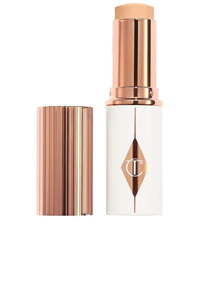 Charlotte Tilbury Unreal Skin Sheer Glow Tint Hydrating Foundation Stick | Image 1 Charlotte Tilbury Unreal Skin Sheer Glow Tint Hydrating Foundation Stick | Image 1