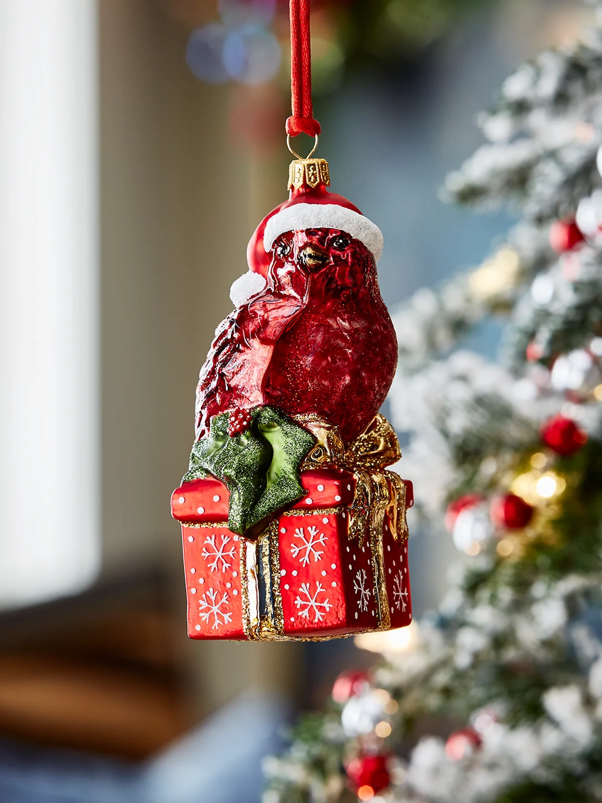 Exclusively Ours Cardinal On A Present Glass Ornament
