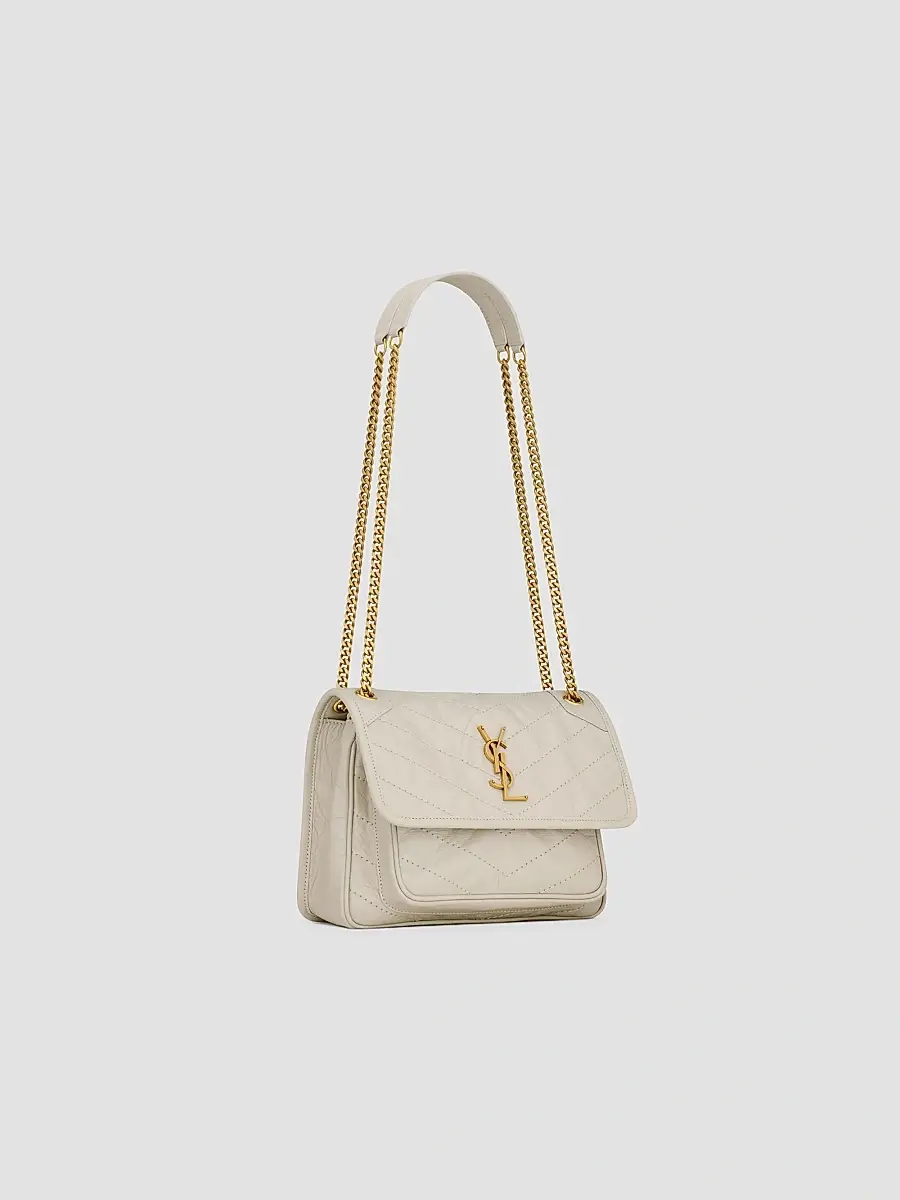 Saint Laurent Women's Niki Baby Crossbody Bag in Vintage Leather - White | Thumbnail 6 Saint Laurent Women's Niki Baby Crossbody Bag in Vintage Leather - White | Thumbnail 6