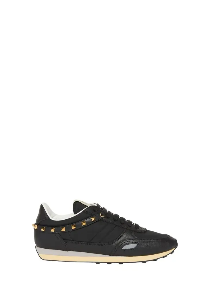 Valentino Garavani Men's Stud Up Low-Top Sneakers | Image 1 Valentino Garavani Men's Stud Up Low-Top Sneakers | Image 1