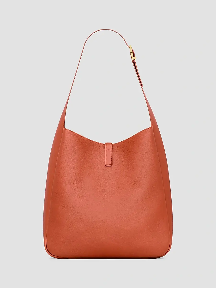 Saint Laurent Women's Le 5 À 7 Supple Large Shoulder Bag in Grained Leather - Dark Mandarin | Thumbnail 2 Saint Laurent Women's Le 5 À 7 Supple Large Shoulder Bag in Grained Leather - Dark Mandarin | Thumbnail 2