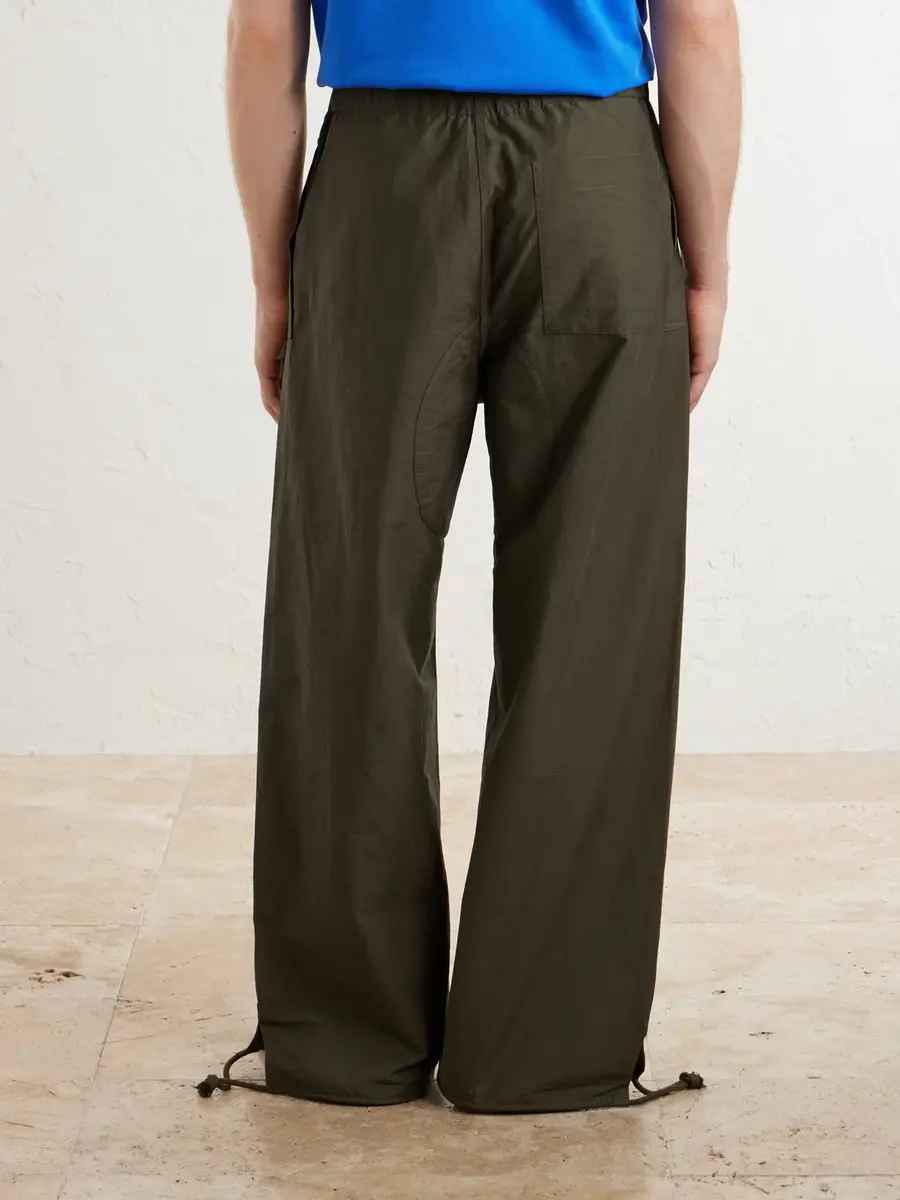 JW Anderson Wide-Leg Cotton-Blend Canvas Parachute Trousers - Men | Thumbnail 4 JW Anderson Wide-Leg Cotton-Blend Canvas Parachute Trousers - Men | Thumbnail 4