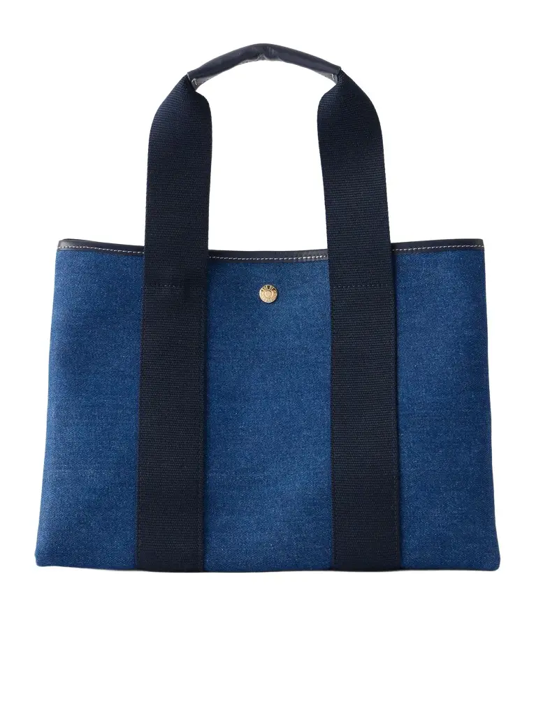 Traversée medium leather and webbing-trimmed denim tote Traversée medium leather and webbing-trimmed denim tote