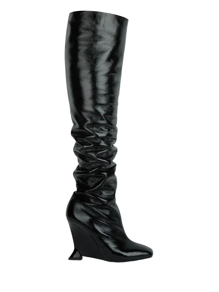 Thigh-high wedge boots in crinkled patent leather