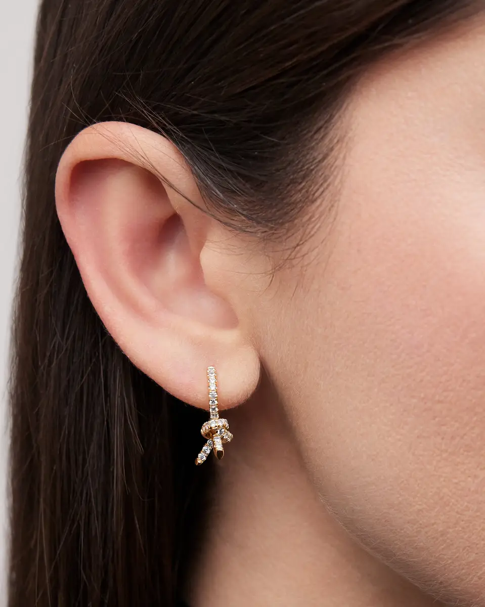 Jennifer Fisher Jennifer Fisher Knot Huggie with Pavé White Diamonds Right Ear / 18K White Gold | Thumbnail 2 Jennifer Fisher Jennifer Fisher Knot Huggie with Pavé White Diamonds Right Ear / 18K White Gold | Thumbnail 2