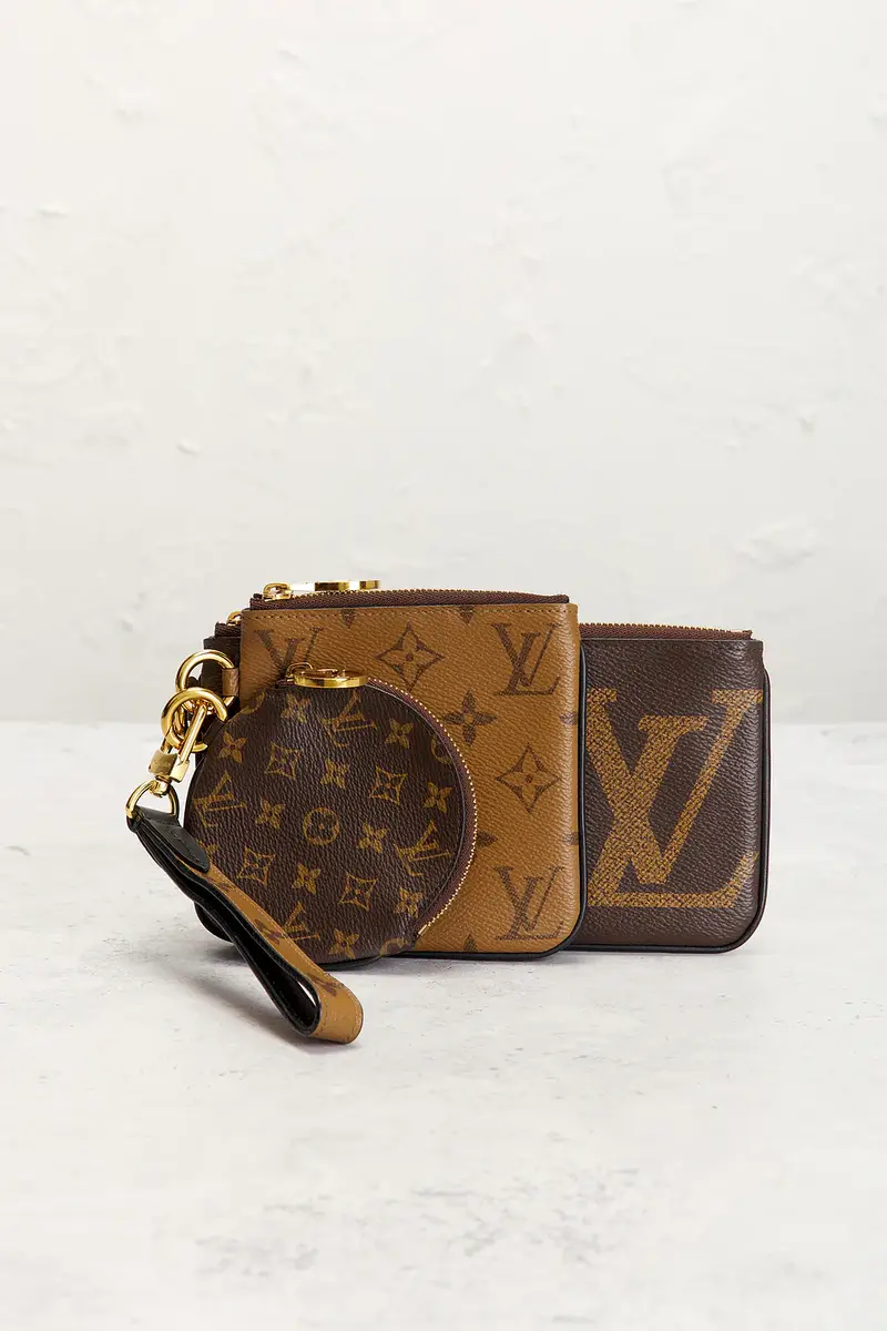 Louis Vuitton Louis Vuitton Reverse Monogram Giant Trio Pouch | Thumbnail 2 Louis Vuitton Louis Vuitton Reverse Monogram Giant Trio Pouch | Thumbnail 2