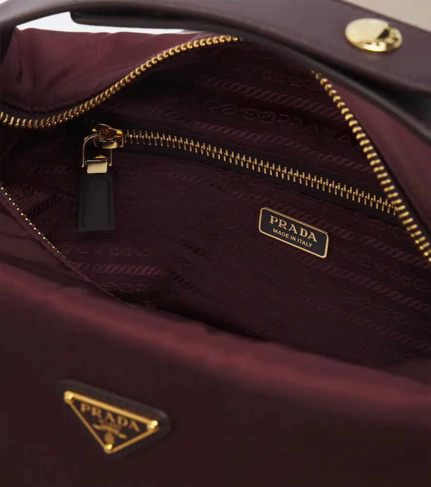 Prada Chérie Mini Re-Nylon top-handle bag | Thumbnail 2 Prada Chérie Mini Re-Nylon top-handle bag | Thumbnail 2