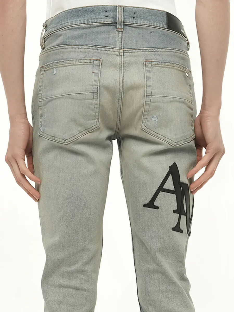 AMIRI Staggered Logo Skinny Jeans in Antique Indigo/black | Thumbnail 3 AMIRI Staggered Logo Skinny Jeans in Antique Indigo/black | Thumbnail 3