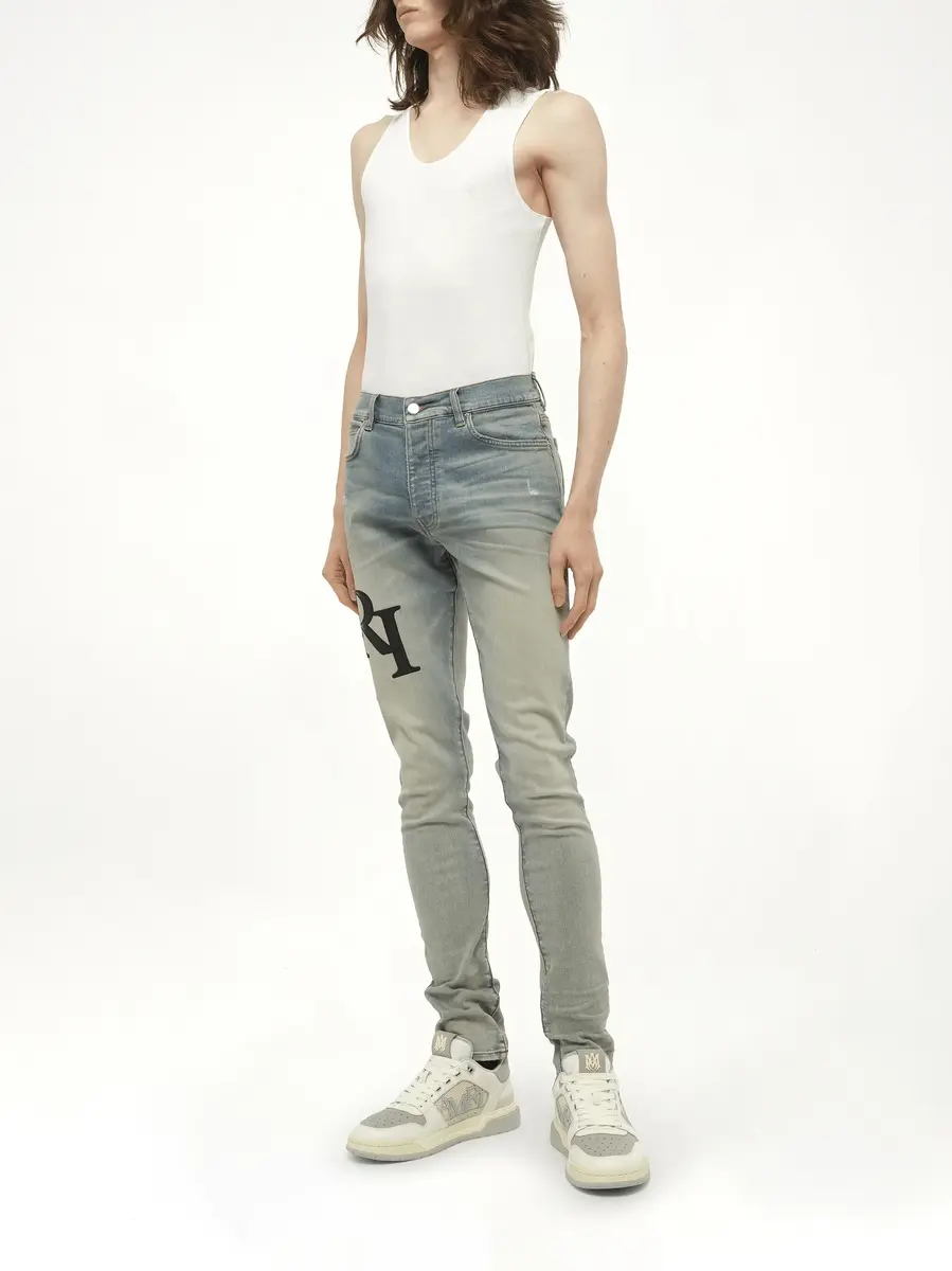 AMIRI Staggered Logo Skinny Jeans in Antique Indigo/black | Thumbnail 4 AMIRI Staggered Logo Skinny Jeans in Antique Indigo/black | Thumbnail 4