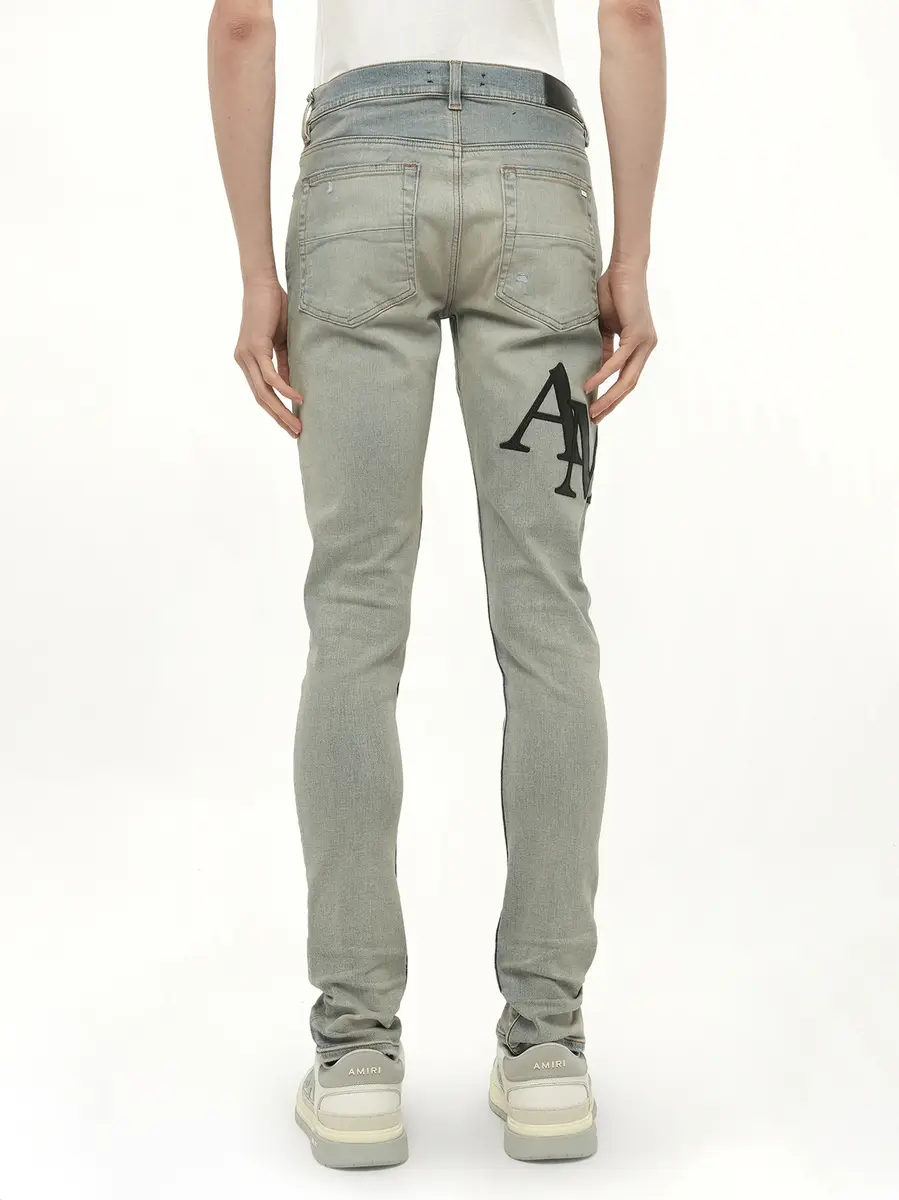 AMIRI Staggered Logo Skinny Jeans in Antique Indigo/black | Thumbnail 6 AMIRI Staggered Logo Skinny Jeans in Antique Indigo/black | Thumbnail 6