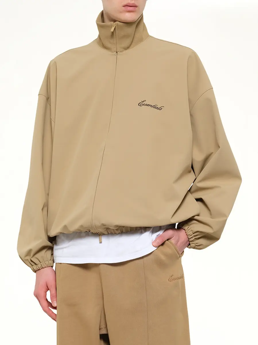 Fear of God Essentials Signature Full Zip Track Jacket in Dune | Thumbnail 6 Fear of God Essentials Signature Full Zip Track Jacket in Dune | Thumbnail 6