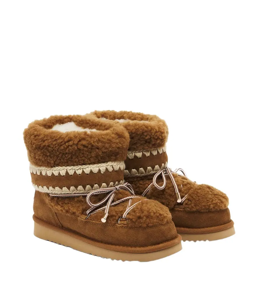 18 suede-trimmed shearling ankle boots 18 suede-trimmed shearling ankle boots