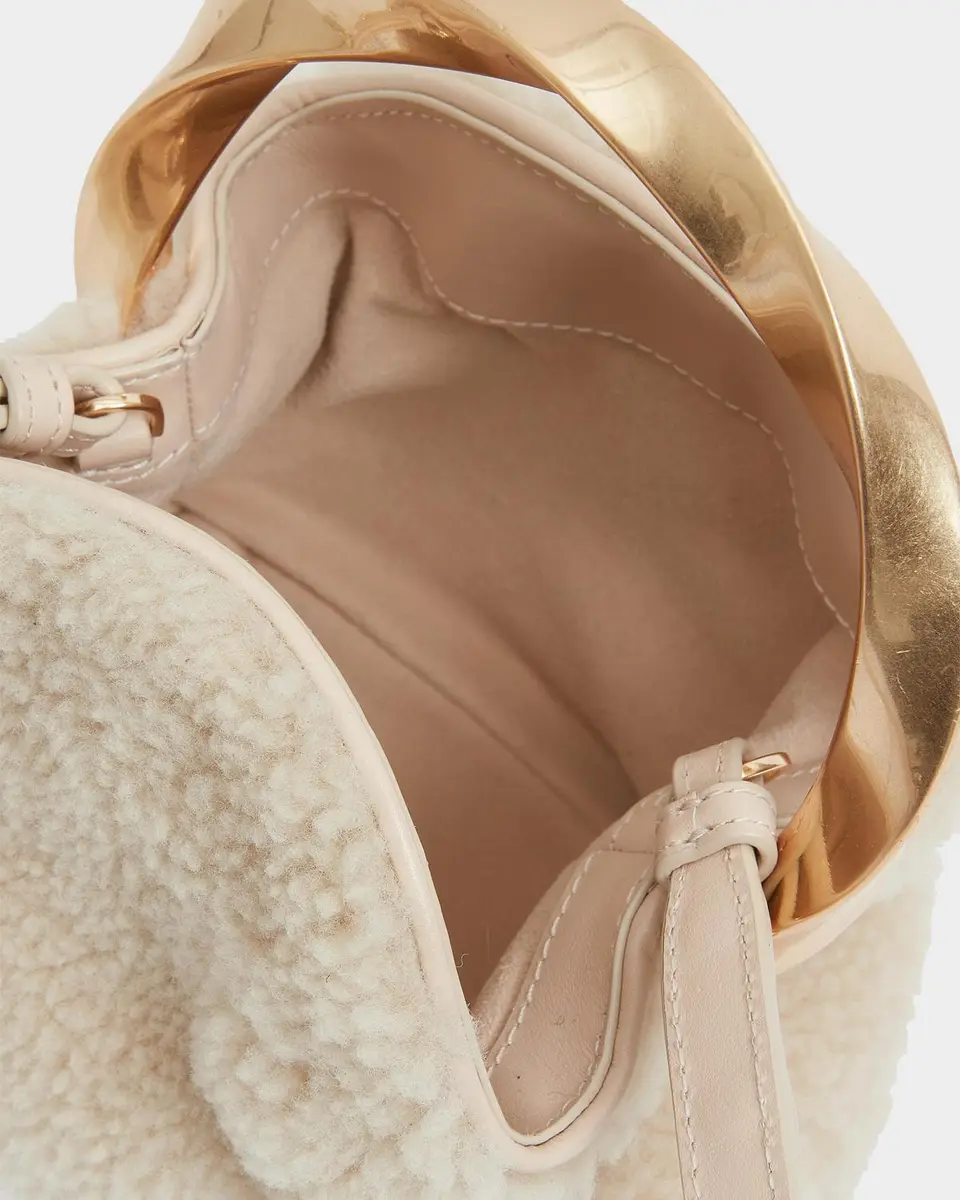 Simkhai Nixi Twist-Handle Shearling Bucket Bag | Thumbnail 2 Simkhai Nixi Twist-Handle Shearling Bucket Bag | Thumbnail 2