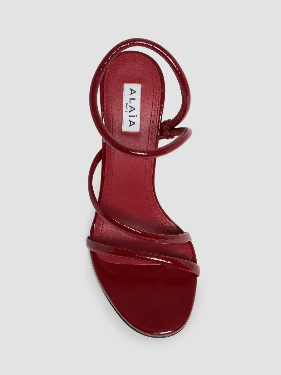Alaïa Women's Loop 90MM Patent Leather Sandals | Thumbnail 6 Alaïa Women's Loop 90MM Patent Leather Sandals | Thumbnail 6