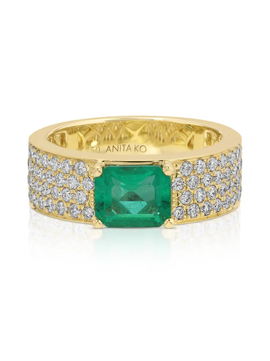 WIDE DIAMOND BAND WITH EMERALD CUT EMERALD CENTER