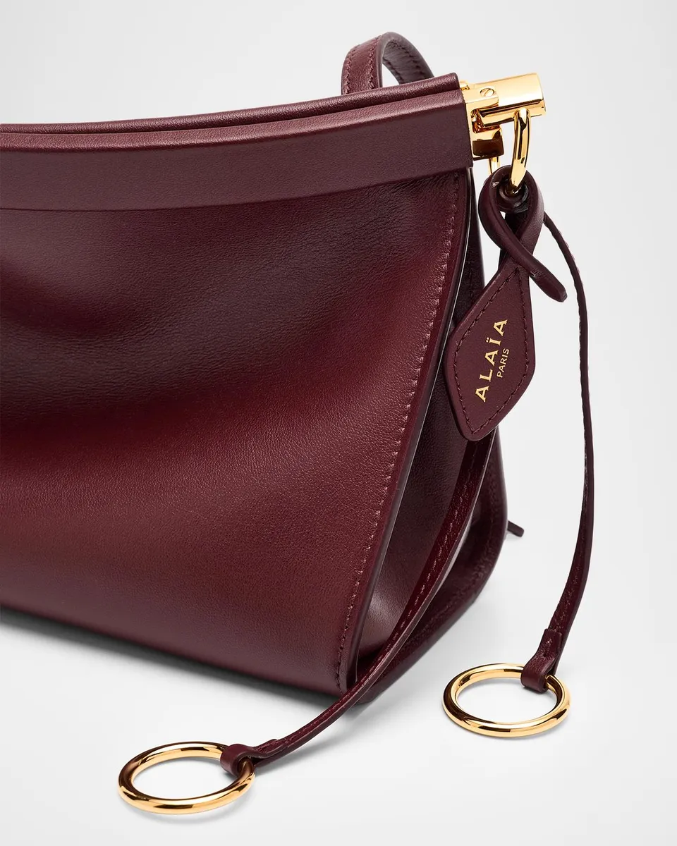 Alaïa Le Click Medium Shoulder Bag in Glossy Leather | Thumbnail 6 Alaïa Le Click Medium Shoulder Bag in Glossy Leather | Thumbnail 6