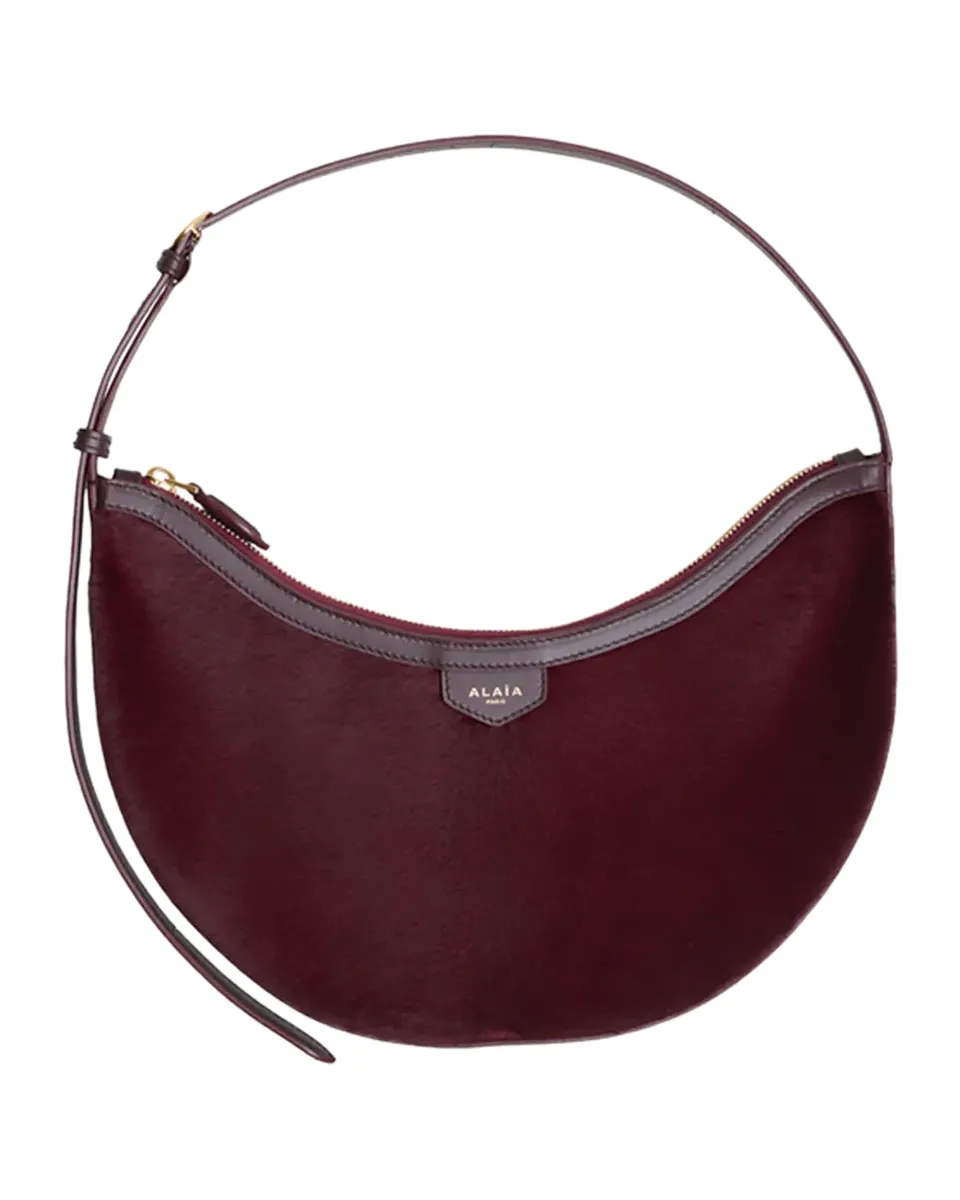 ALAÏA One Piece Demi-Lune Calf-Hair Bag | Thumbnail 2 ALAÏA One Piece Demi-Lune Calf-Hair Bag | Thumbnail 2