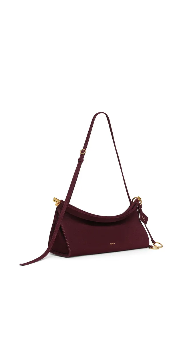 Alaïa Le Click East West Medium Bag In Nubuck | Thumbnail 2 Alaïa Le Click East West Medium Bag In Nubuck | Thumbnail 2