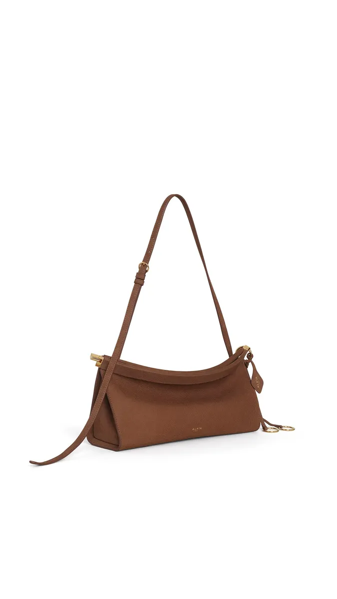 Alaïa Le Click East West Medium Bag In Nubuck | Thumbnail 2 Alaïa Le Click East West Medium Bag In Nubuck | Thumbnail 2