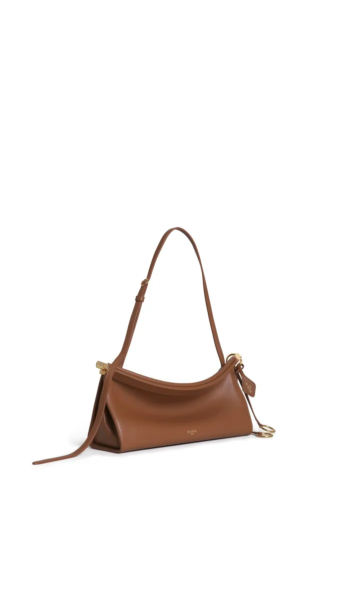 Alaïa Le Click East West Medium Bag In Calfskin | Thumbnail 2 Alaïa Le Click East West Medium Bag In Calfskin | Thumbnail 2