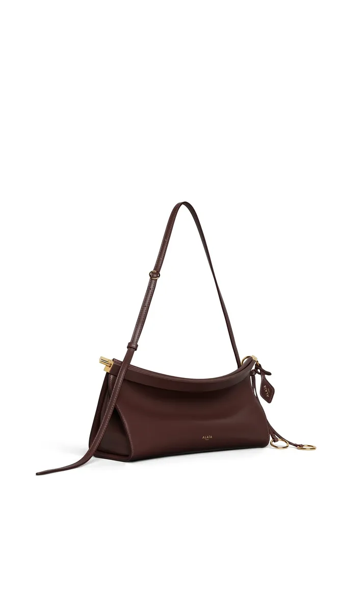 Alaïa Le Click East West Medium Bag In Calfskin | Thumbnail 2 Alaïa Le Click East West Medium Bag In Calfskin | Thumbnail 2