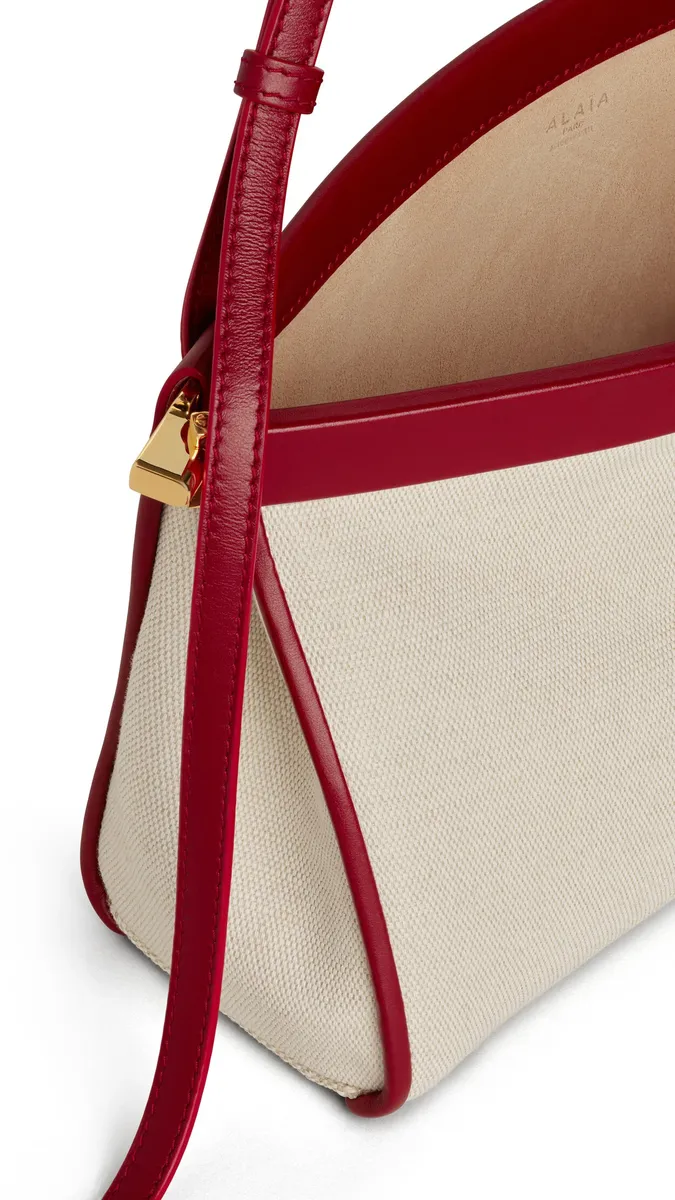 Alaïa Le Click East West Medium Bag In Canvas | Thumbnail 3 Alaïa Le Click East West Medium Bag In Canvas | Thumbnail 3