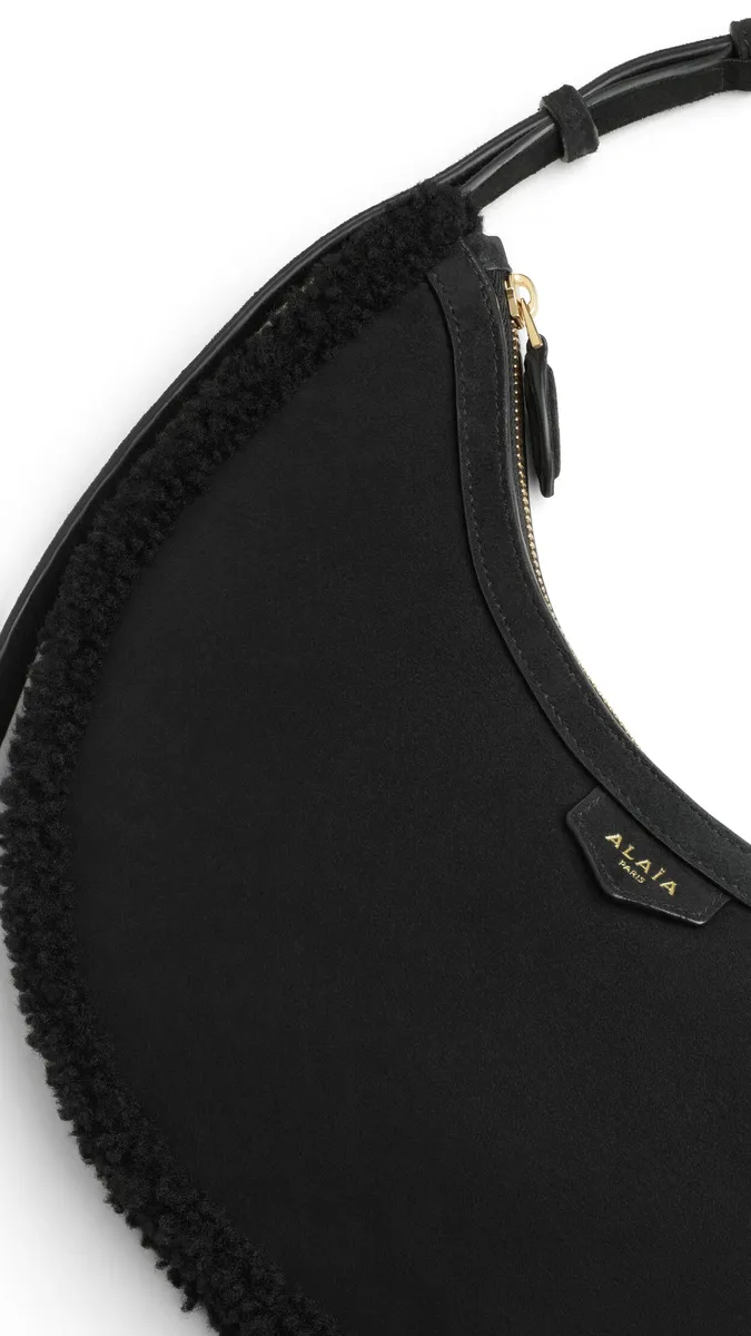 Alaïa One Piece Demi Lune Bag In Merino Shearling | Thumbnail 2 Alaïa One Piece Demi Lune Bag In Merino Shearling | Thumbnail 2